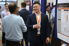Medical student presents his findings at Research Week.