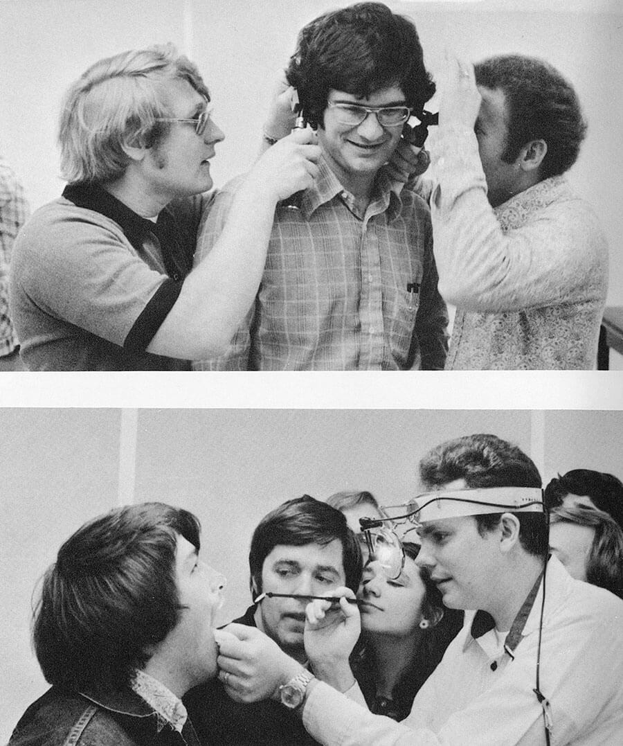 historic photo of students performing small health exams