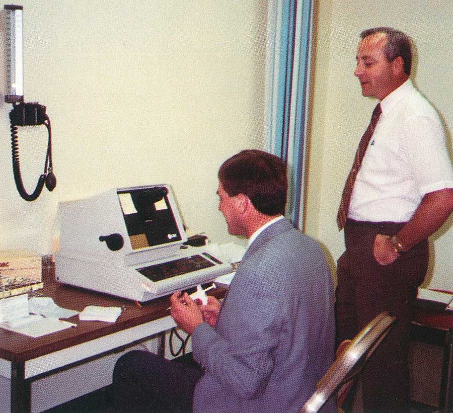 2 students talking and examing