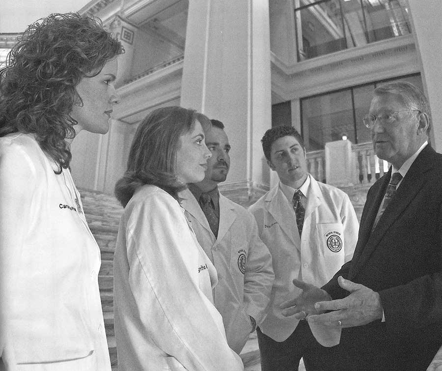 Students with university president David Schmidly at the state Capitol