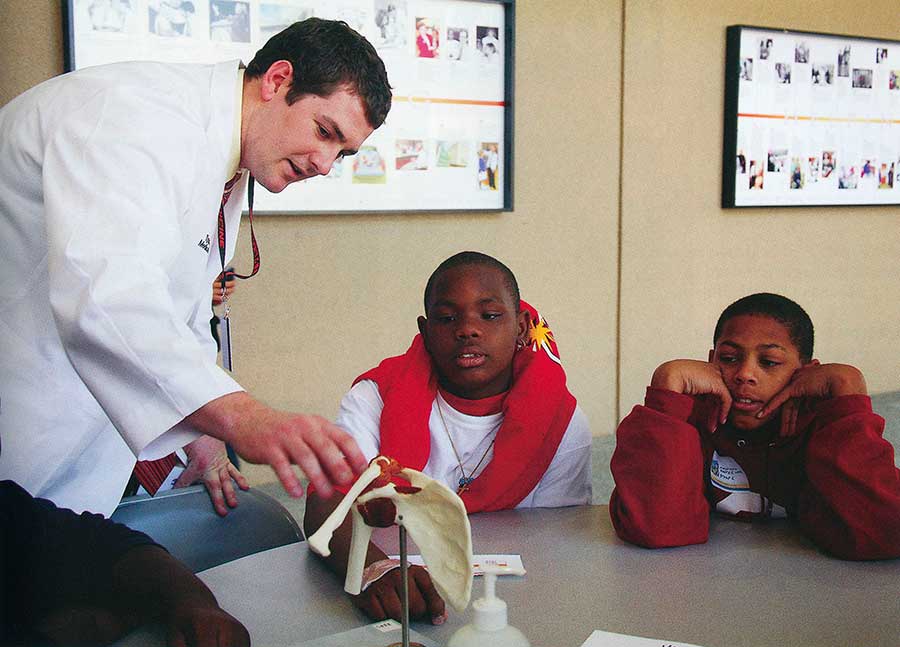 Demonstrating anatomy to the children was a great experience for everyone. Tyson Bryant demonstrates a shoulder.