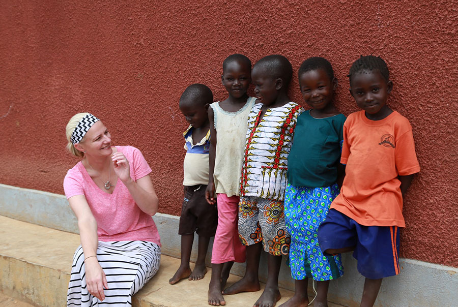 Dr. Kayse Shrum talks with children during a global health Pros for Africa trip. Dr. Kayse Shrum talks with children during a global health Pros for Africa trip.
