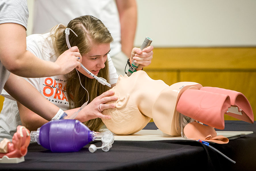 Students practice intubation during an Operation Orange event. Students practice intubation during an Operation Orange event.