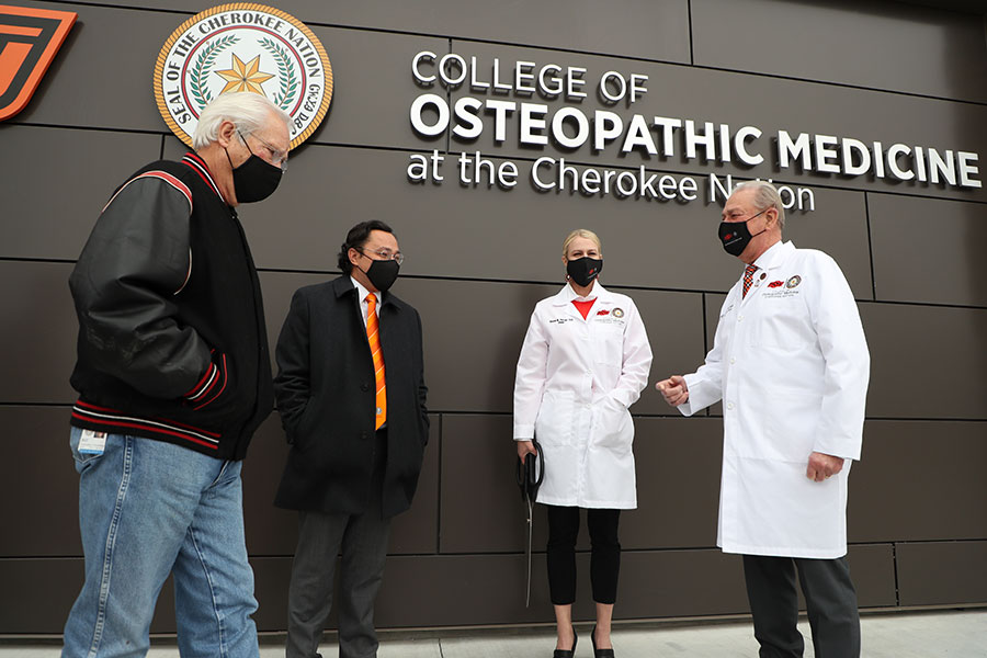 Former Cherokee Nation Principal Chief Bill John Baker (left), current chief Chuck Hoskin, Jr., Oklahoma State University Center for Health Sciences President Dr. Kayse Shrum and Dr. William Pettit (right) Former Cherokee Nation Principal Chief Bill John Baker (left), current chief Chuck Hoskin, Jr., Oklahoma State University Center for Health Sciences President Dr. Kayse Shrum and Dr. William Pettit (right)