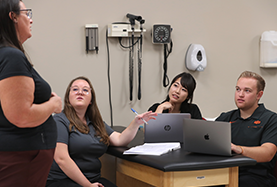 Athletic Training Students Talking to the Instructor