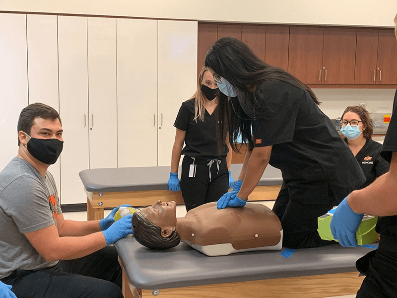 OSU-COM students in Tulsa tackle Basic Life Support Training. OSU-COM students in Tulsa tackle Basic Life Support Training.