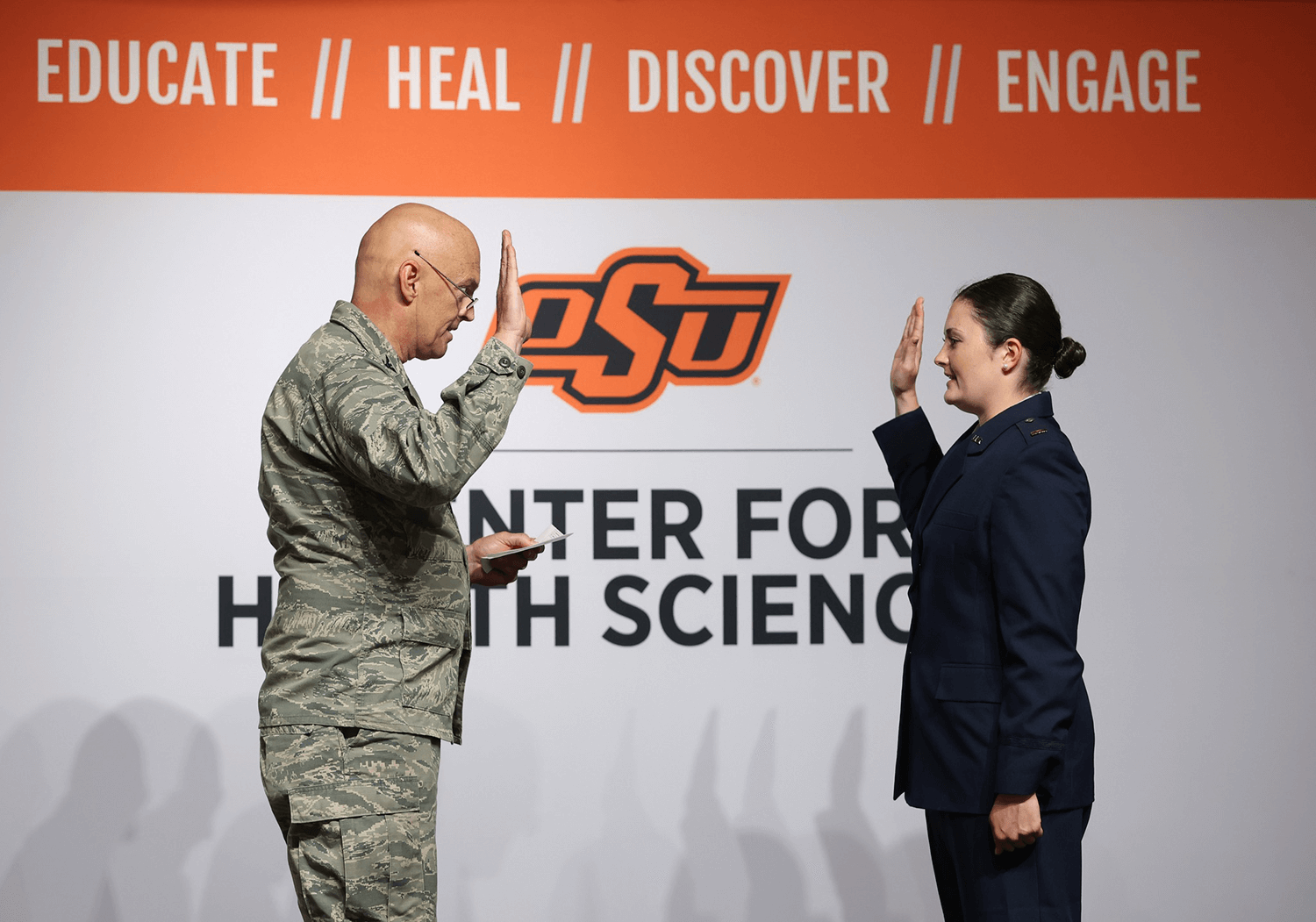 Photo of OSU students participating in the Military Commissioning Ceremony. Photo of OSU students participating in the Military Commissioning Ceremony.